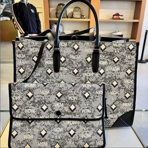 Authentic MCM black large size tote with pouch $1100+tax